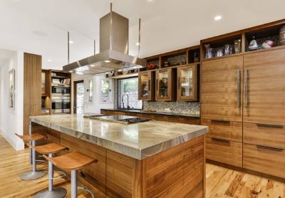 Wood-themed kitchen with wood fridge