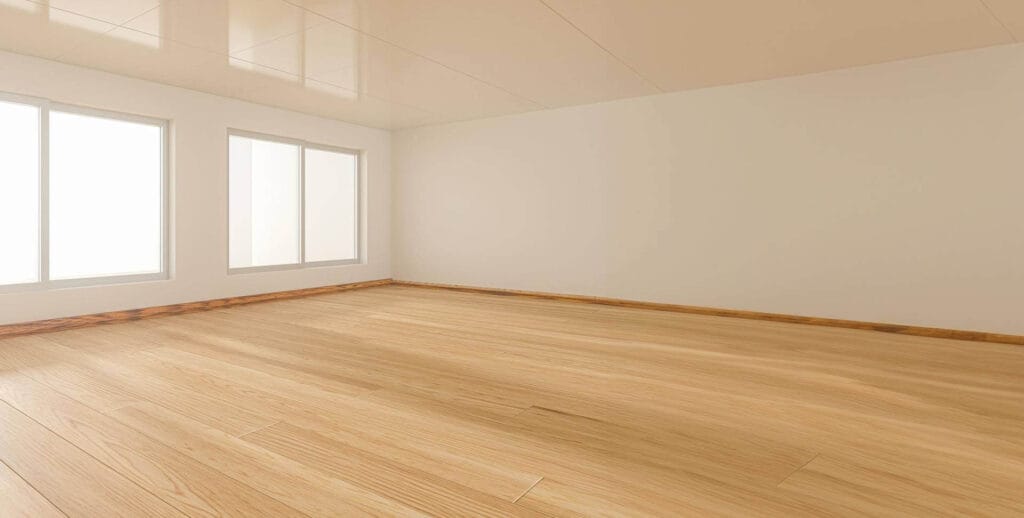 Empty room with clean wood floor and natural sunlight through window